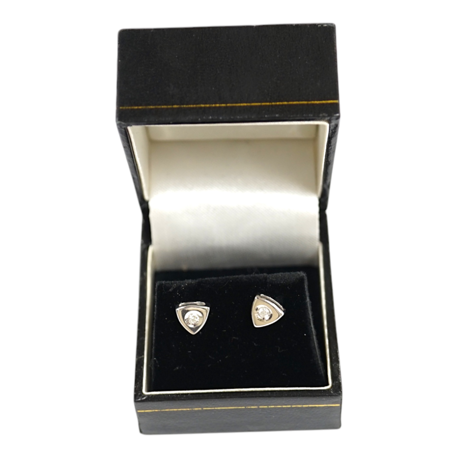 A modern pair of 18ct white gold and single stone diamond set ear studs, 6mm, gross weight 2.8 grams. Condition - fair to good